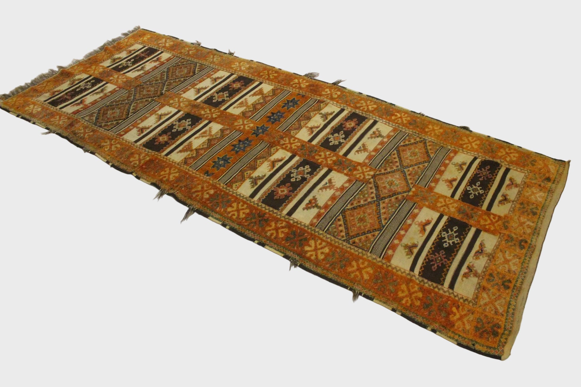 Decorative rug with geometric pattern on a white background