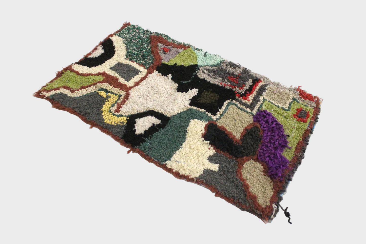 Multicolored textured rug on a white background